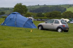 Standard Pitch with medium tent & car