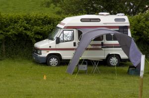 Standard pitch with small campervan