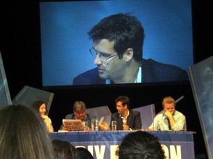 Marcus Brigstocke on stage at Hay